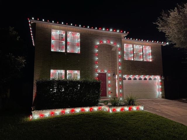 Red and white windows roofline and garden border